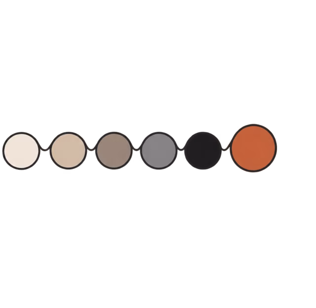 แถบสีไอวอรี ทราย เทาน้ำตาล เทา และดำ ปิดท้ายด้วยสีส้มอิฐหนึ่งสี